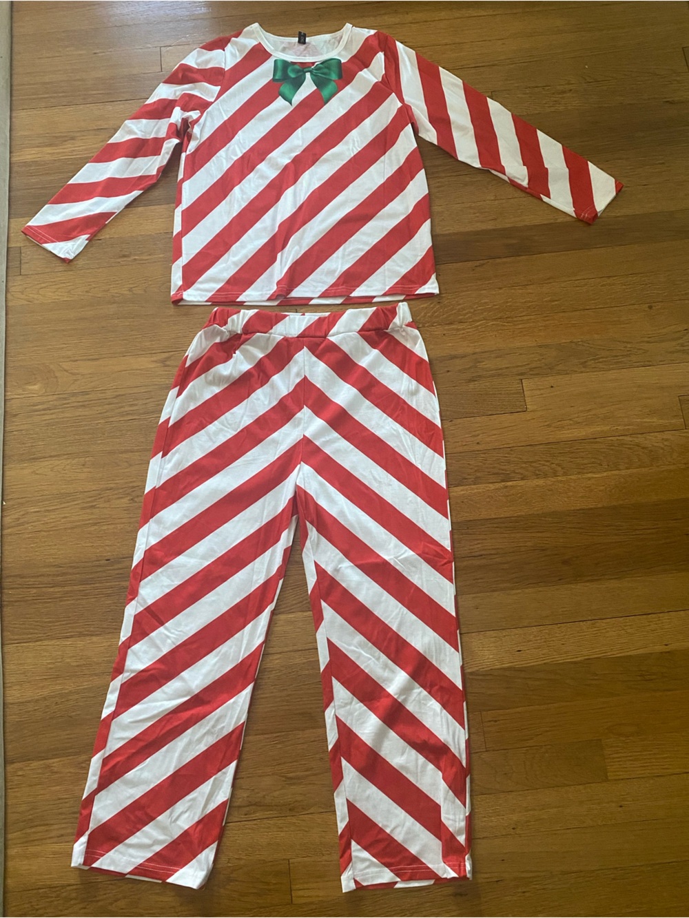 Girls Candy Cane inspired Christmas pajamas with Green Bow